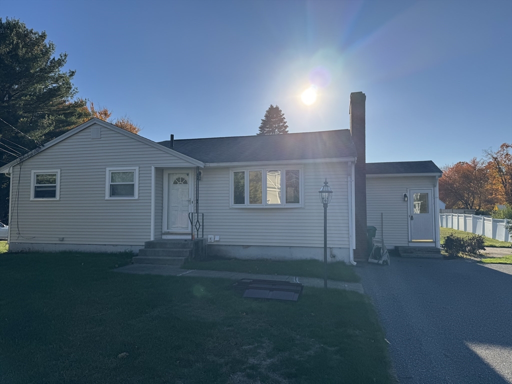 a house view with a garden space