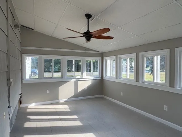 a view of an empty room with a window
