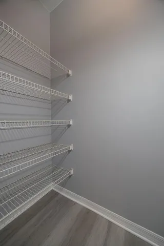 a kitchen with appliances cabinets and a sink