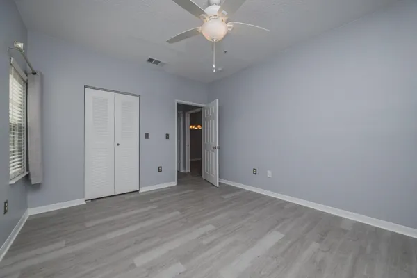 a bathroom with a toilet a sink and bathtub