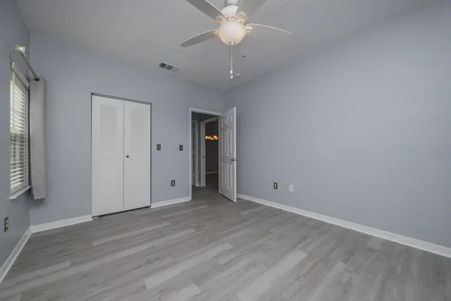 a bathroom with a toilet a sink and bathtub