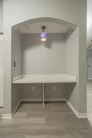 a kitchen with a sink and cabinets