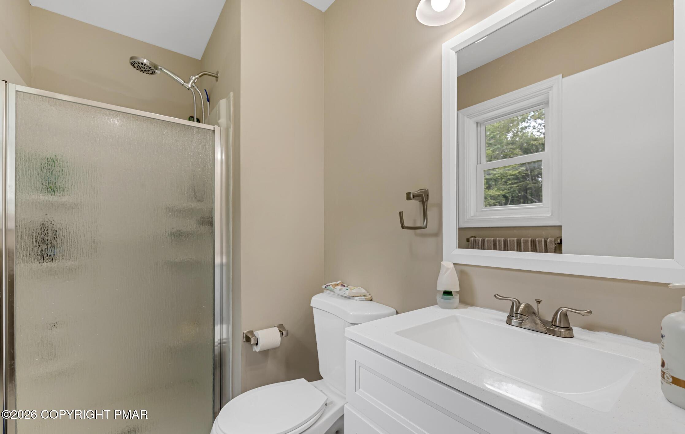 3337 Ross Road Tobyhanna, PA 18466 - Photo 4 of 10 a bathroom with a sink toilet and shower