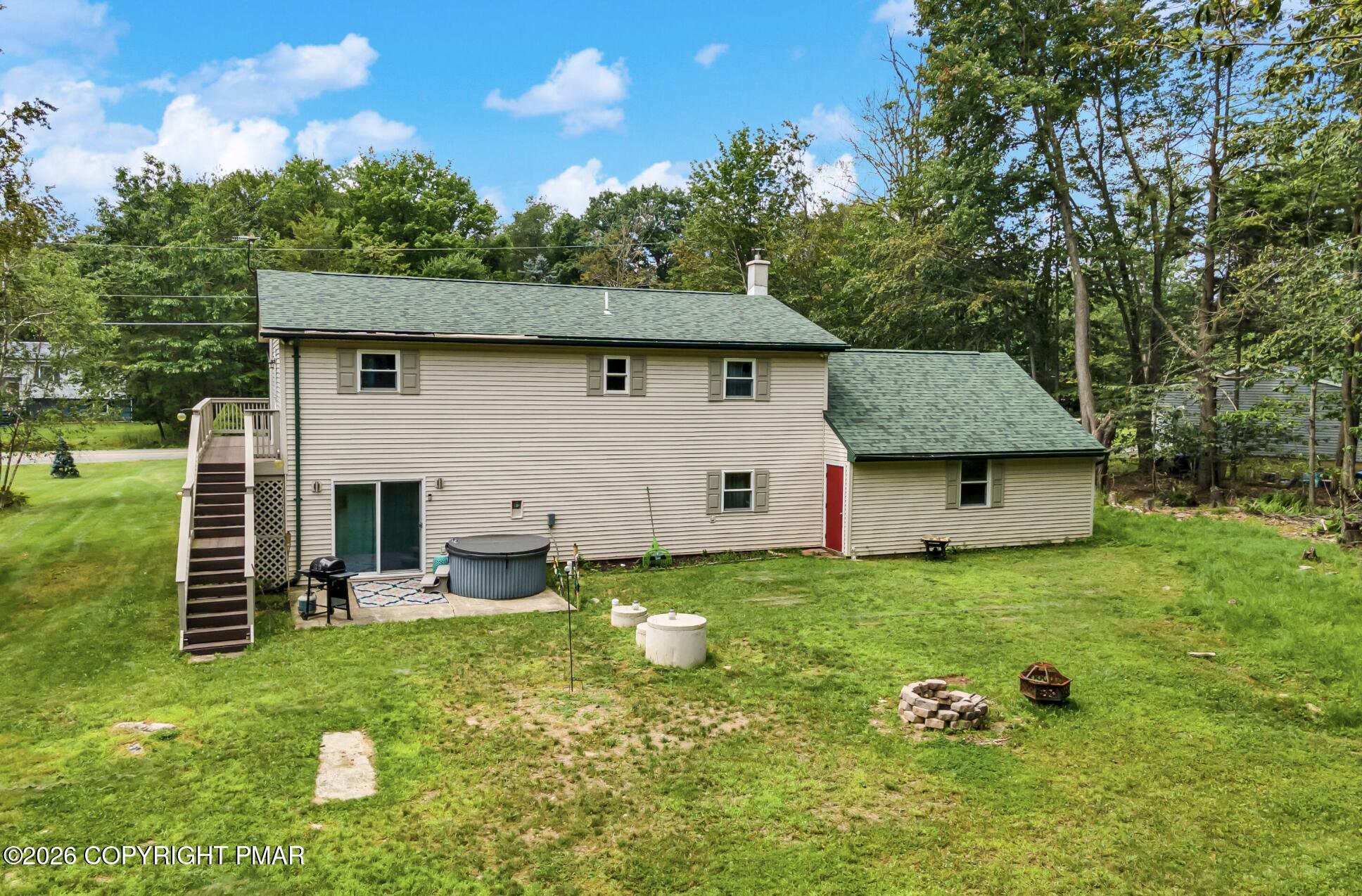 3337 Ross Road Tobyhanna, PA 18466 - Photo 8 of 10 a front view of a house with garden
