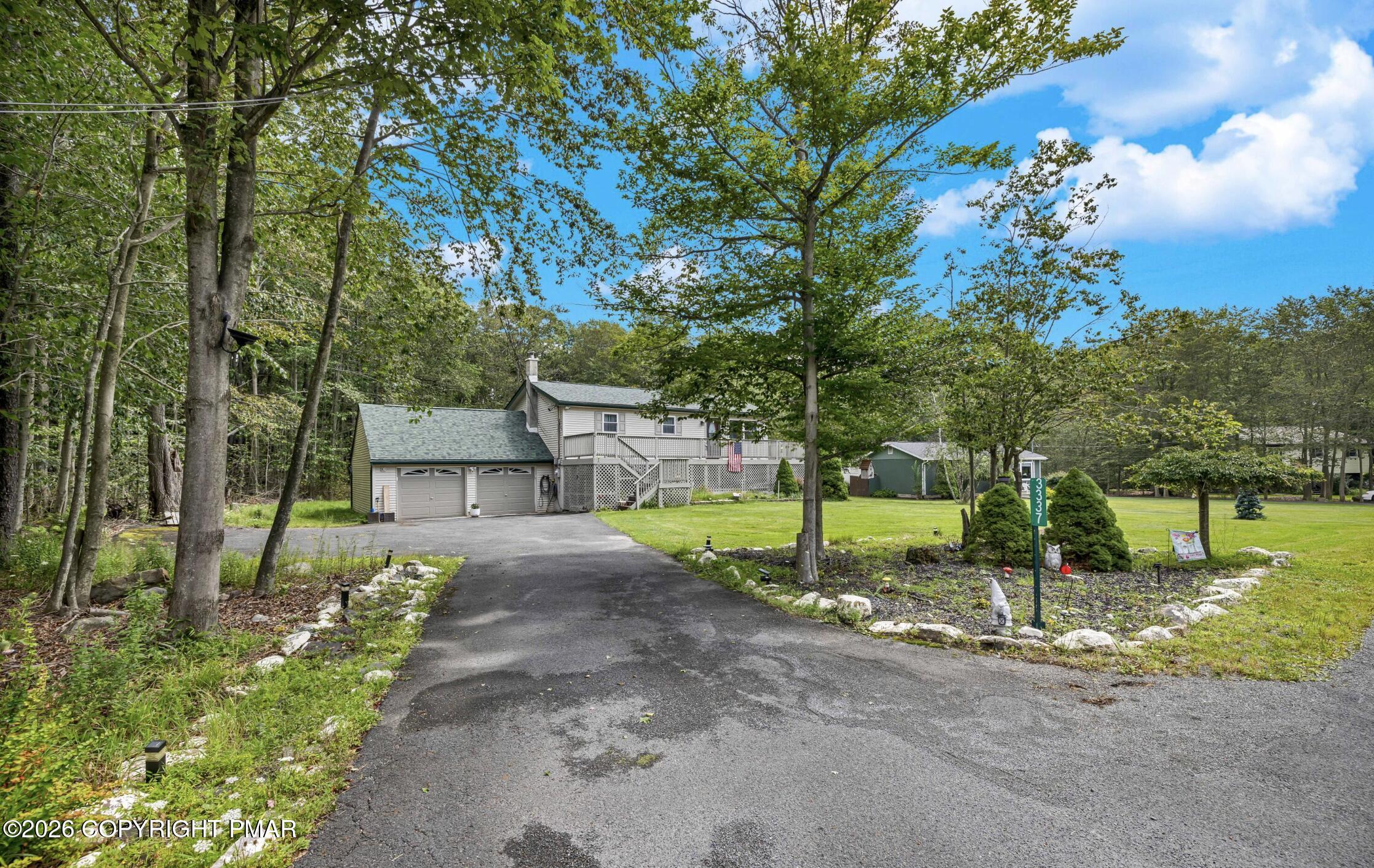 3337 Ross Road Tobyhanna, PA 18466 - Photo 9 of 10 a view of a house with backyard and tree