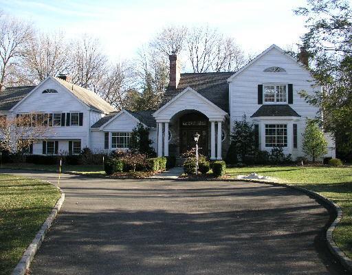 7 Deer Path Road Weston, CT 06883 - Photo 1 of 1 a front view of a house with a yard