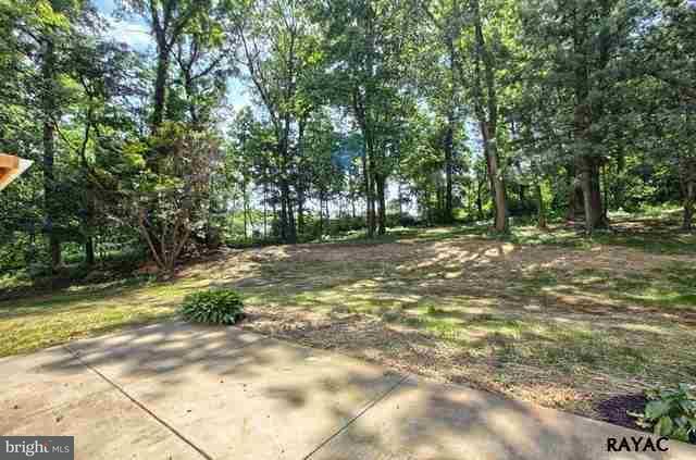 7952 Hickory Road Stewartstown, PA 17363 - Photo 13 of 14 a view of a yard with a tree