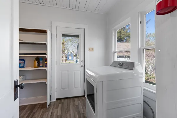a utility room with washer and dryer