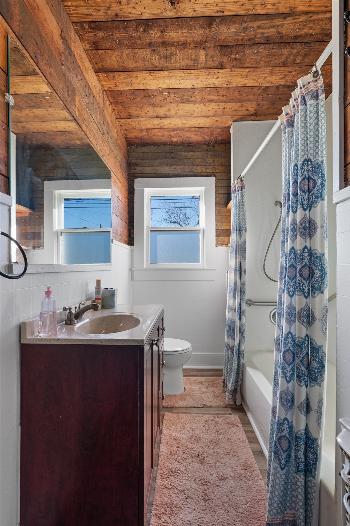 408 South Gabriel Street Granger, TX 76530 - Photo 19 of 29 a bathroom with a sink a toilet and shower