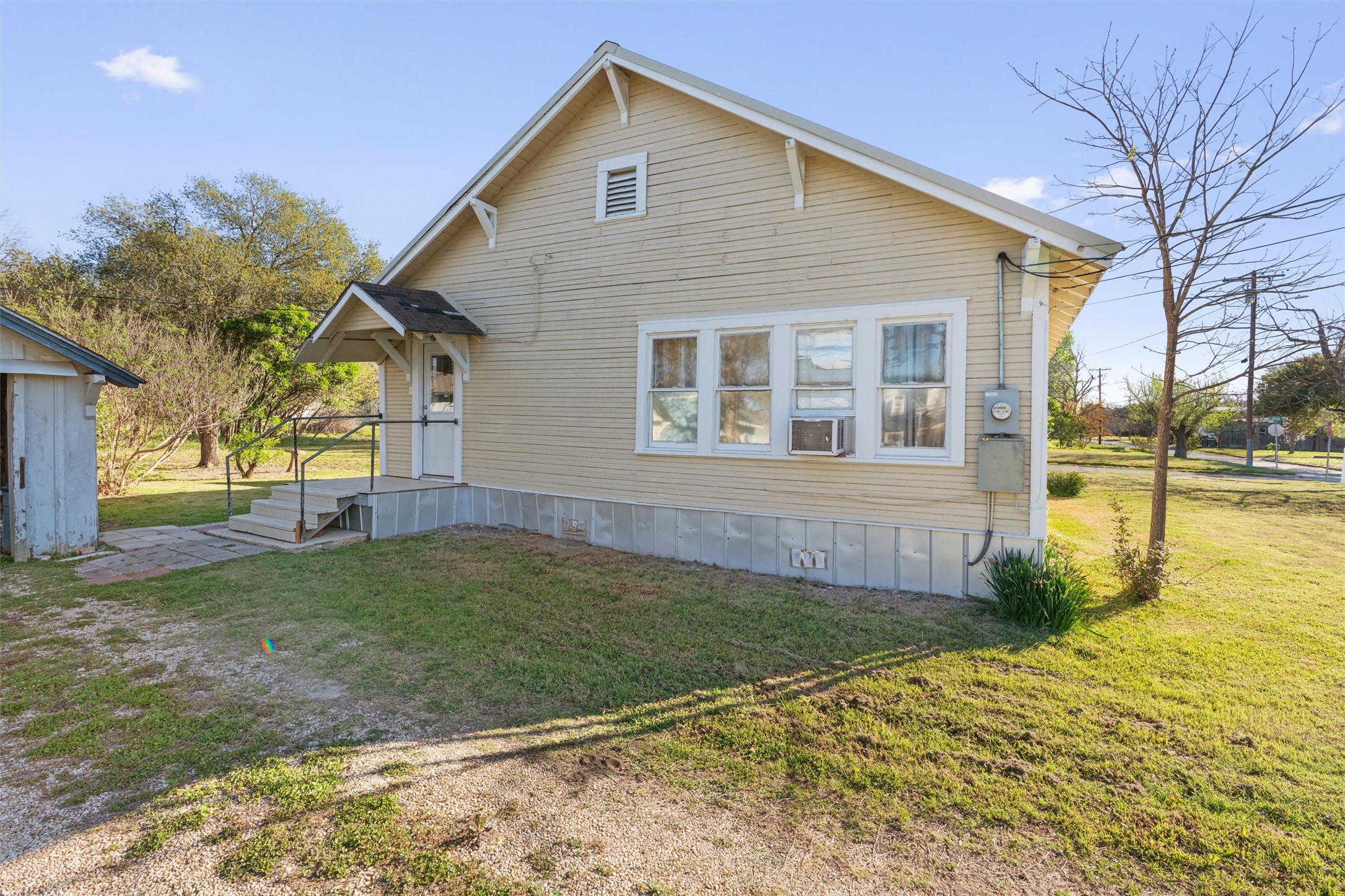408 South Gabriel Street Granger, TX 76530 - Photo 22 of 29 a view of a house with a yard
