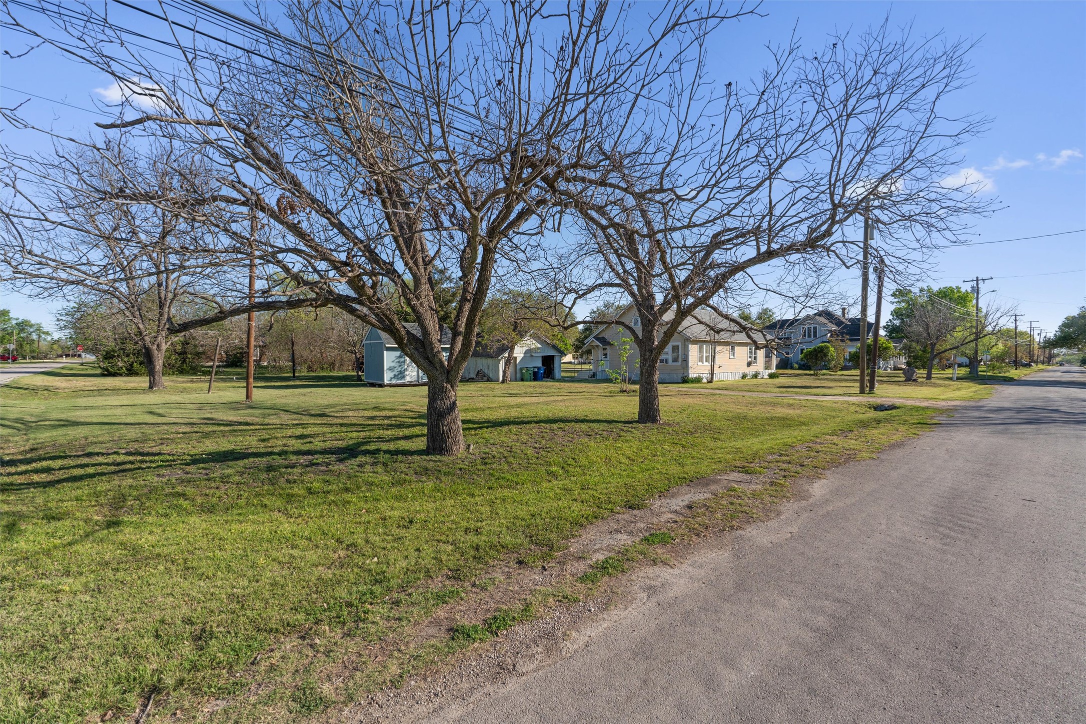 408 South Gabriel Street Granger, TX 76530 - Photo 28 of 29 a view of a ground with tree s