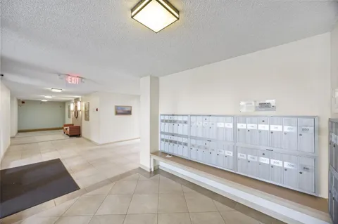 a view of a hallway with closet