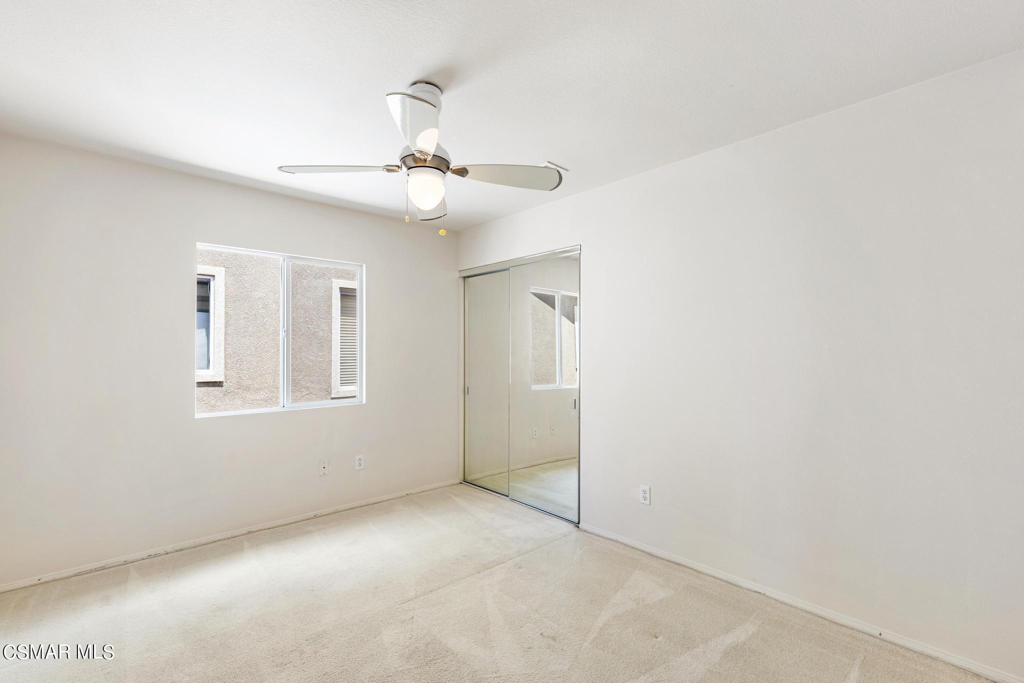 2442 Parade Avenue Simi Valley, CA 93063 - Photo 37 of 76 an empty room with windows and fan