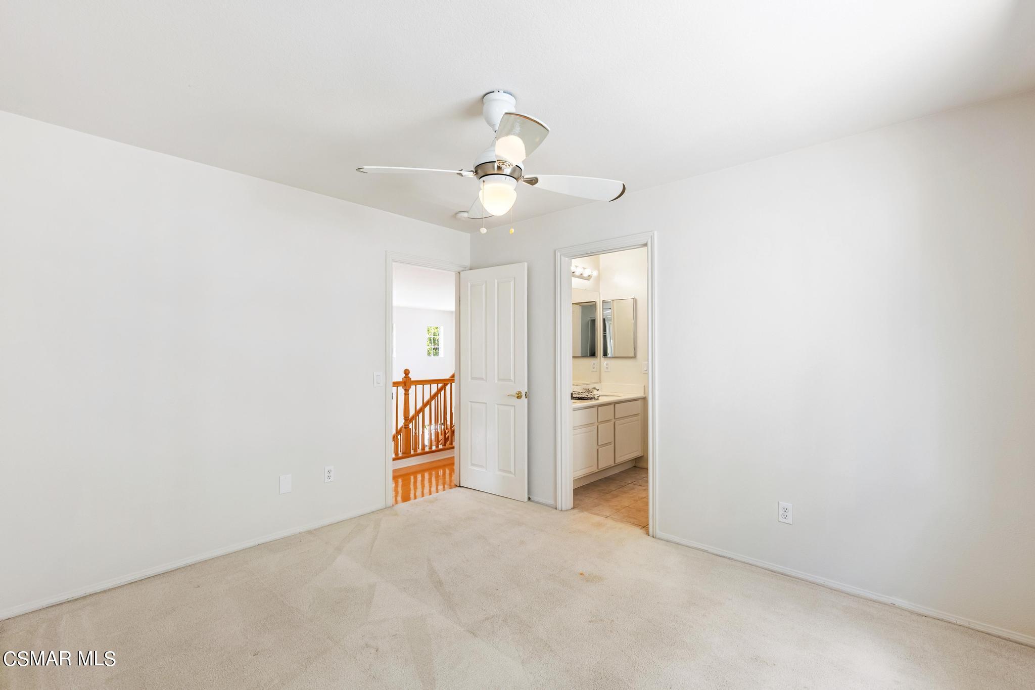 2442 Parade Avenue Simi Valley, CA 93063 - Photo 40 of 76 a view of a room with a stylish ceiling fan and entryway