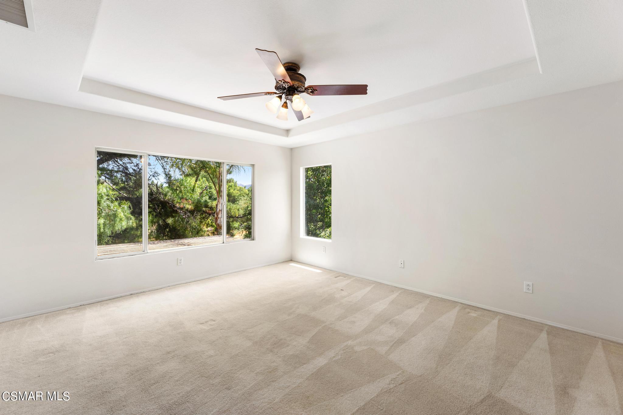 2442 Parade Avenue Simi Valley, CA 93063 - Photo 41 of 76 an empty room with windows and fan