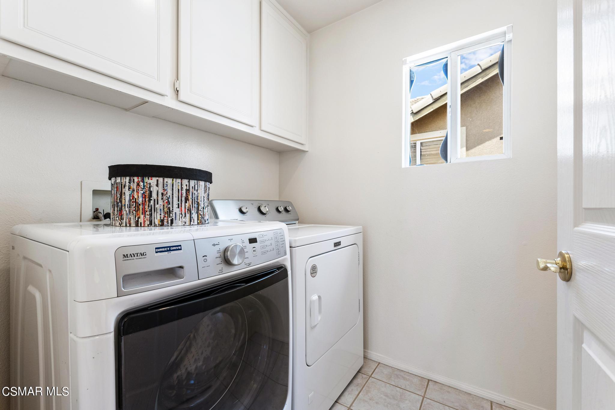 2442 Parade Avenue Simi Valley, CA 93063 - Photo 51 of 76 a utility room with dryer and washer