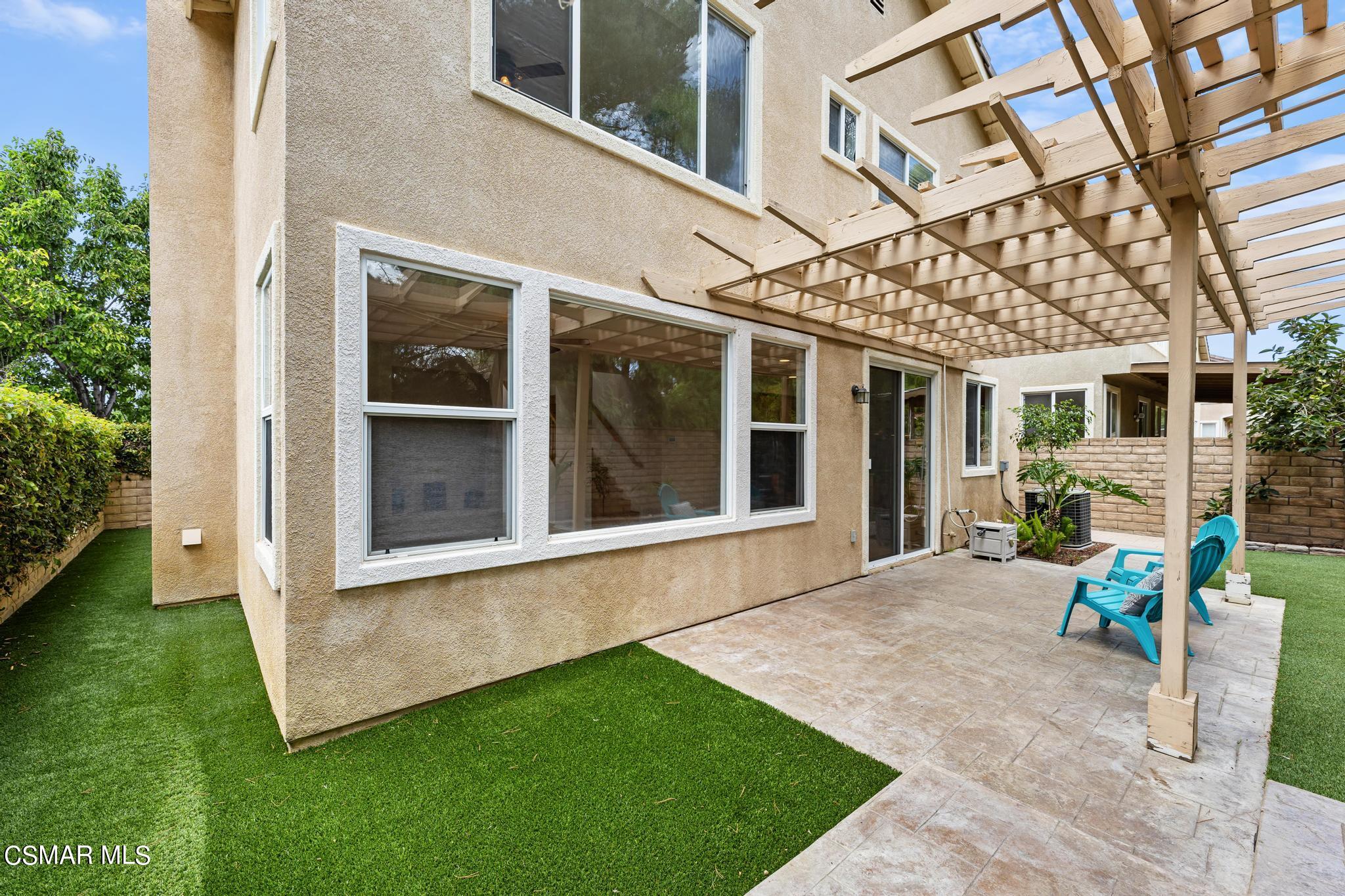 2442 Parade Avenue Simi Valley, CA 93063 - Photo 64 of 76 a view of a house with backyard and porch