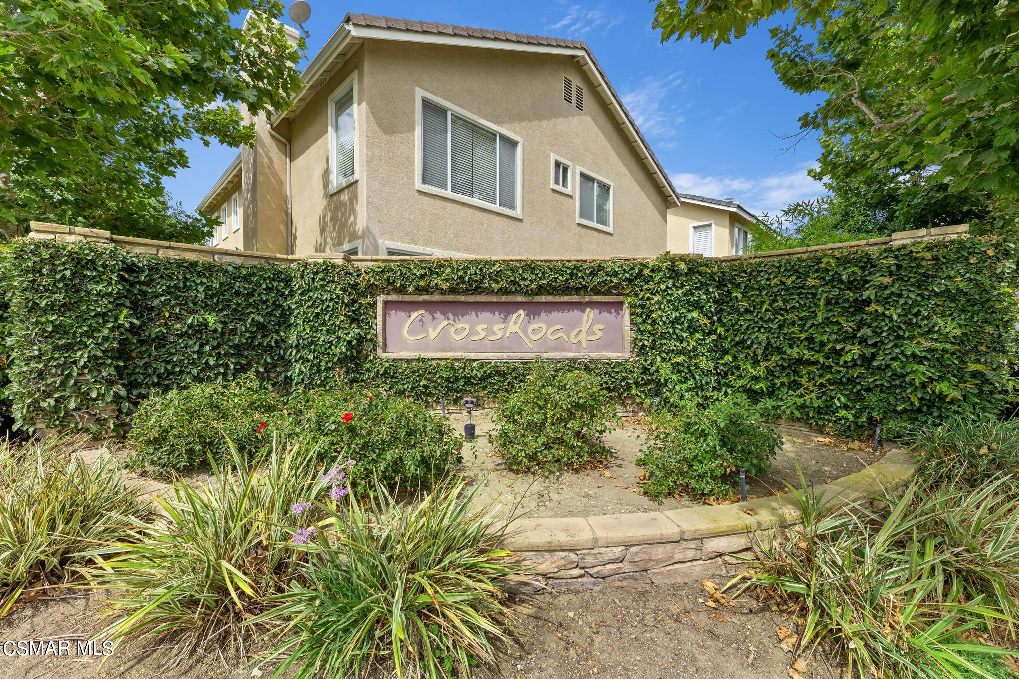2442 Parade Avenue Simi Valley, CA 93063 - Photo 76 of 76 a front view of a house with a yard and garage