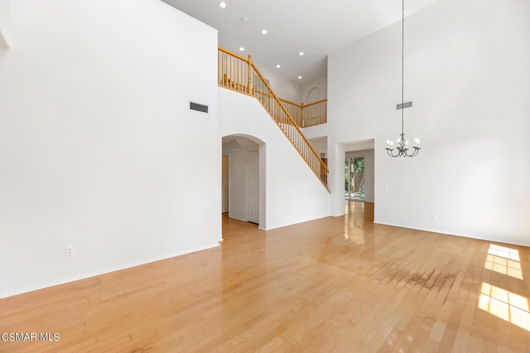 2442 Parade Avenue Simi Valley, CA 93063 - Photo 9 of 76 a view of an empty room with stairs