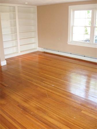 94 Main Street Rutland, MA 01543 - Photo 8 of 11 an empty room with wooden floor and windows