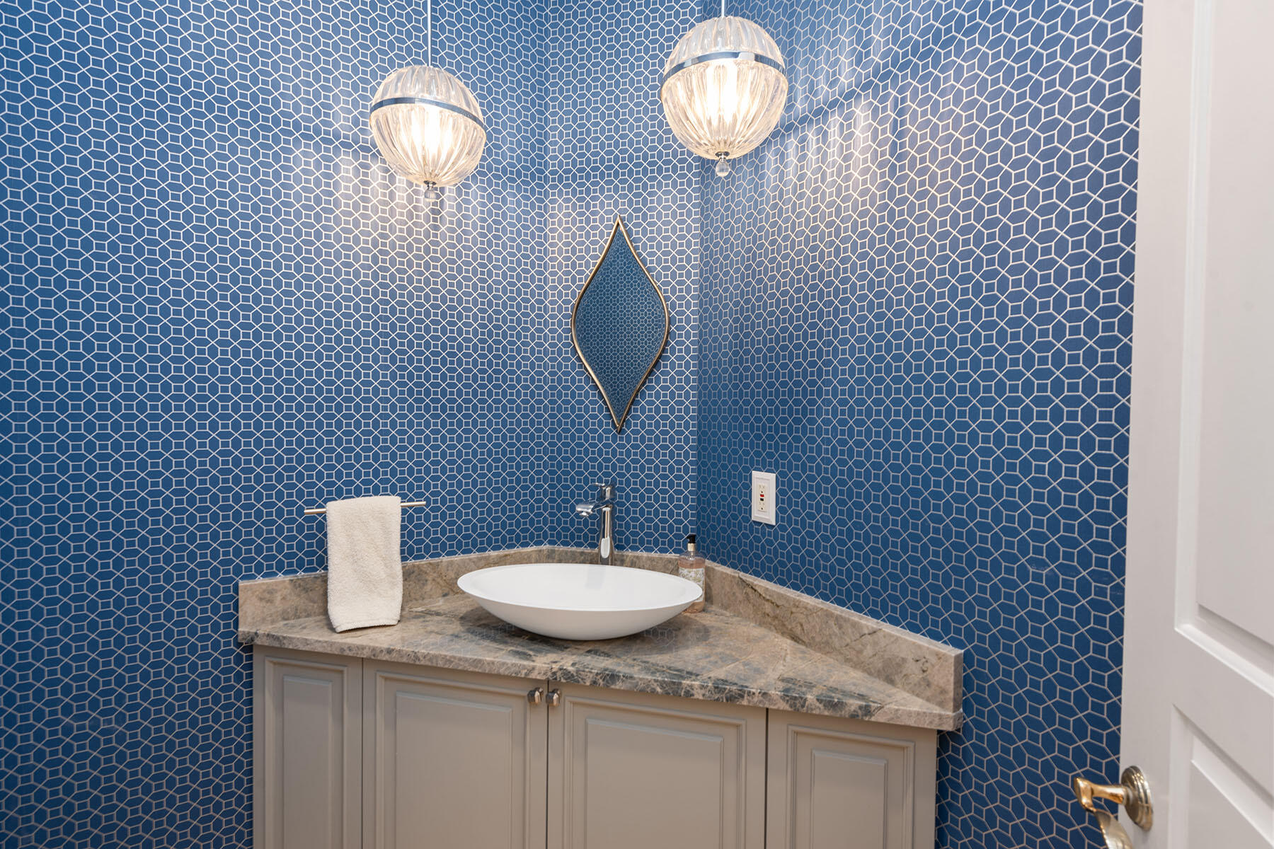 8604 Majorca Lane Naples, FL 34114 - Photo 14 of 49 a sink and a mirror