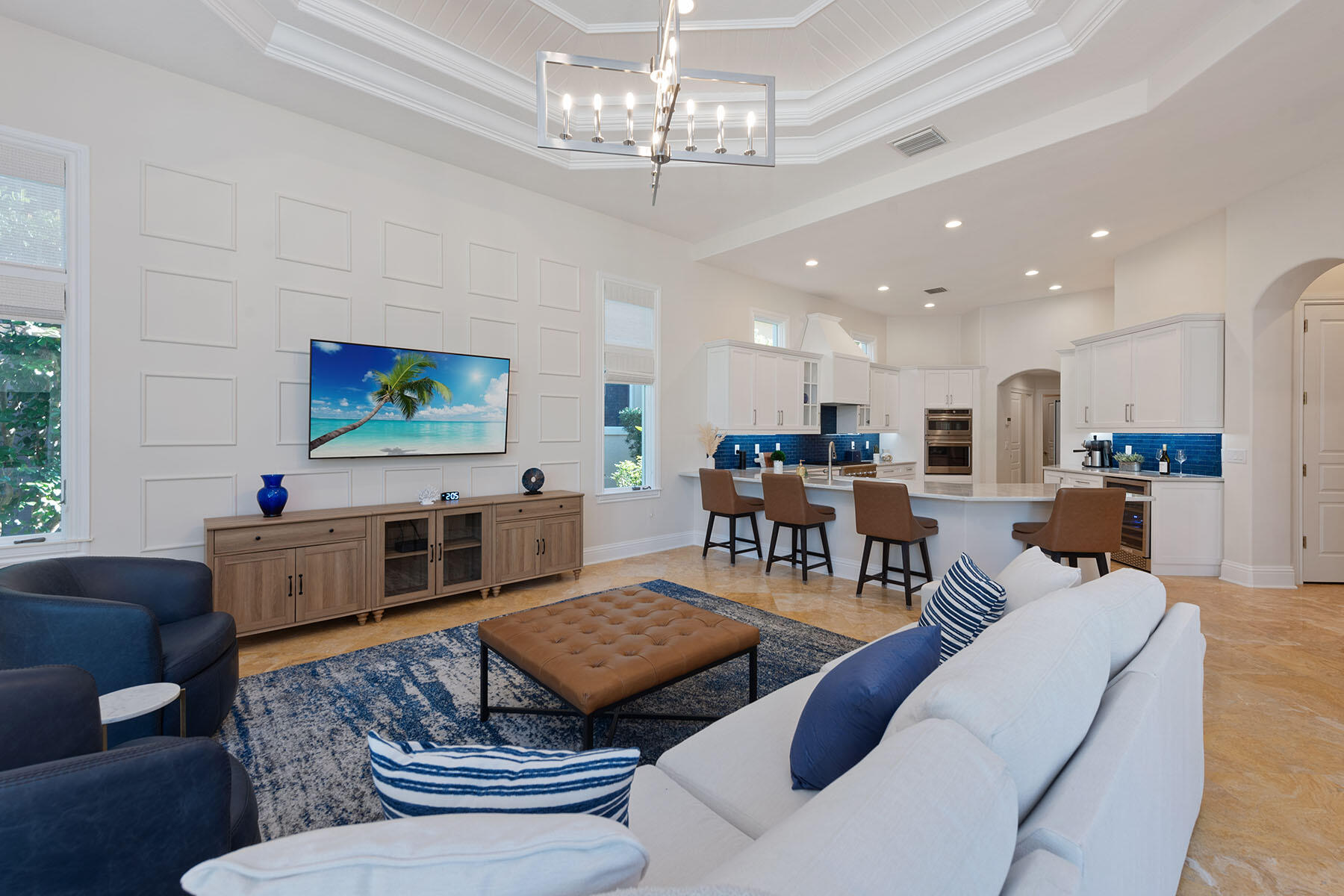 8604 Majorca Lane Naples, FL 34114 - Photo 5 of 49 a living room with furniture kitchen view and a chandelier