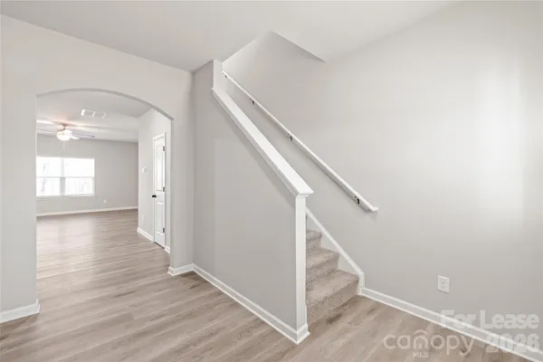 a view of entryway with wooden floor