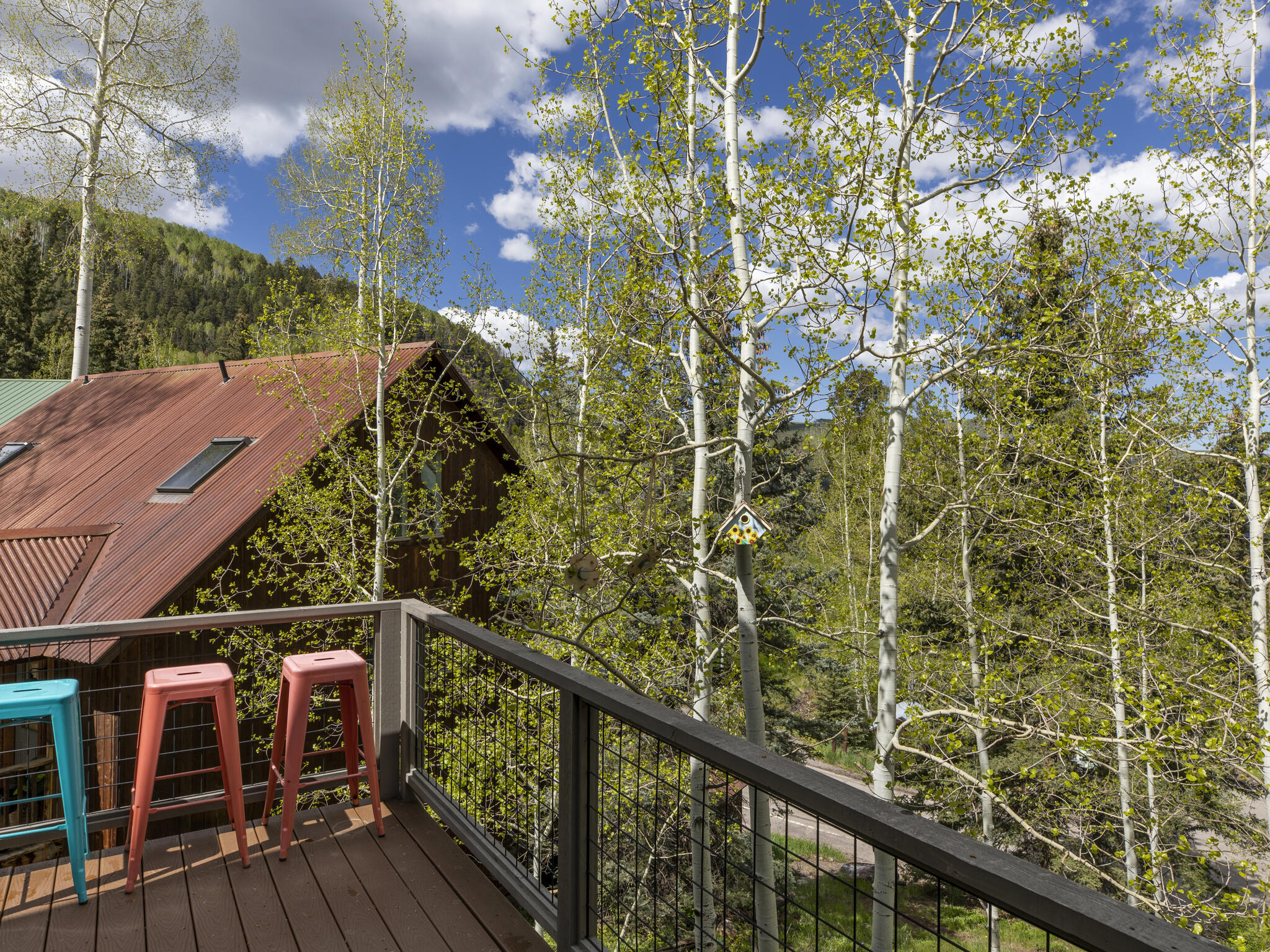 165 Alexander Overlook Telluride, CO 81435 - Photo 9 of 27 a view of balcony with wooden floor and fence