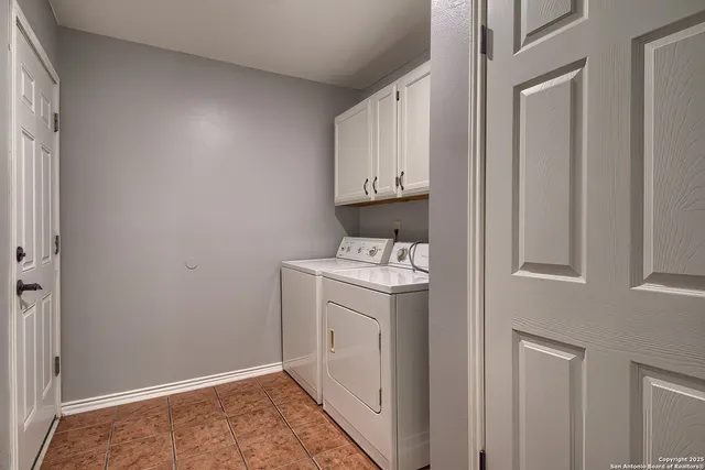 a utility room with a sink