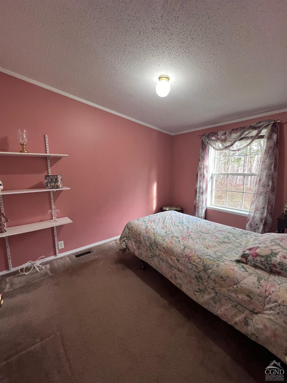 17 North Puffer Road Catskill, NY 12414 - Photo 20 of 26 a bedroom with a bed and a window