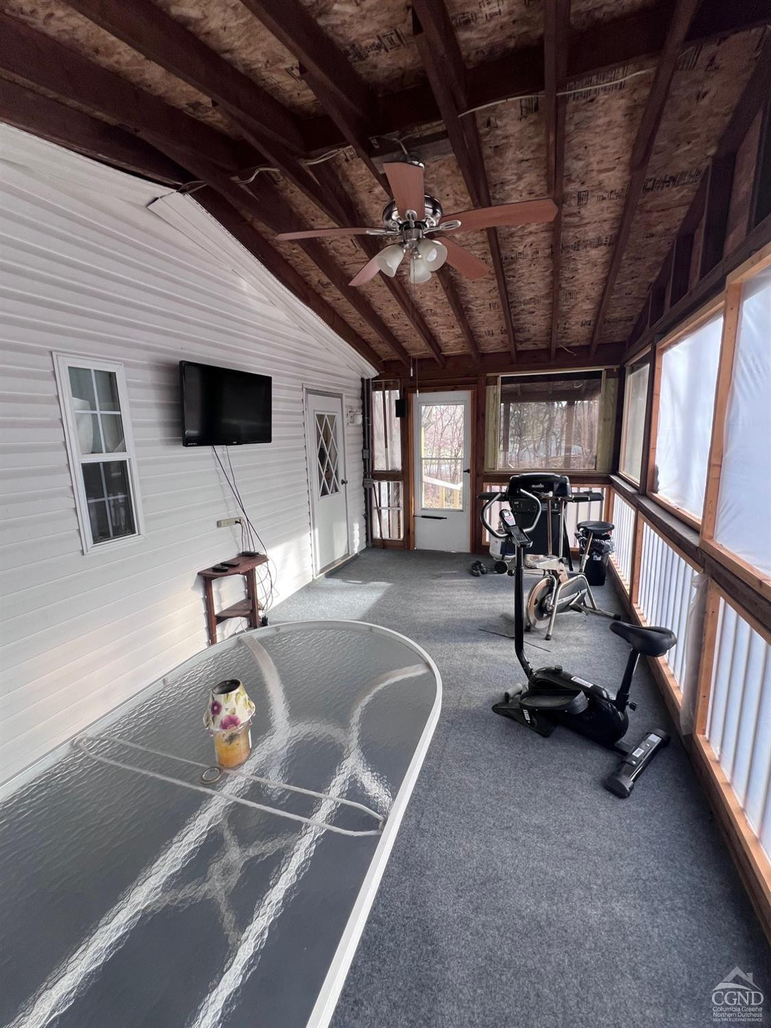 17 North Puffer Road Catskill, NY 12414 - Photo 5 of 26 a view of a livingroom with furniture and a flat screen tv