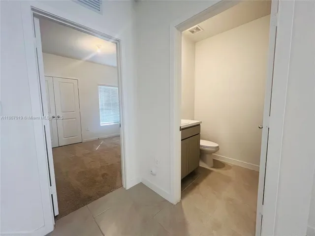 a bathroom that has a toilet
