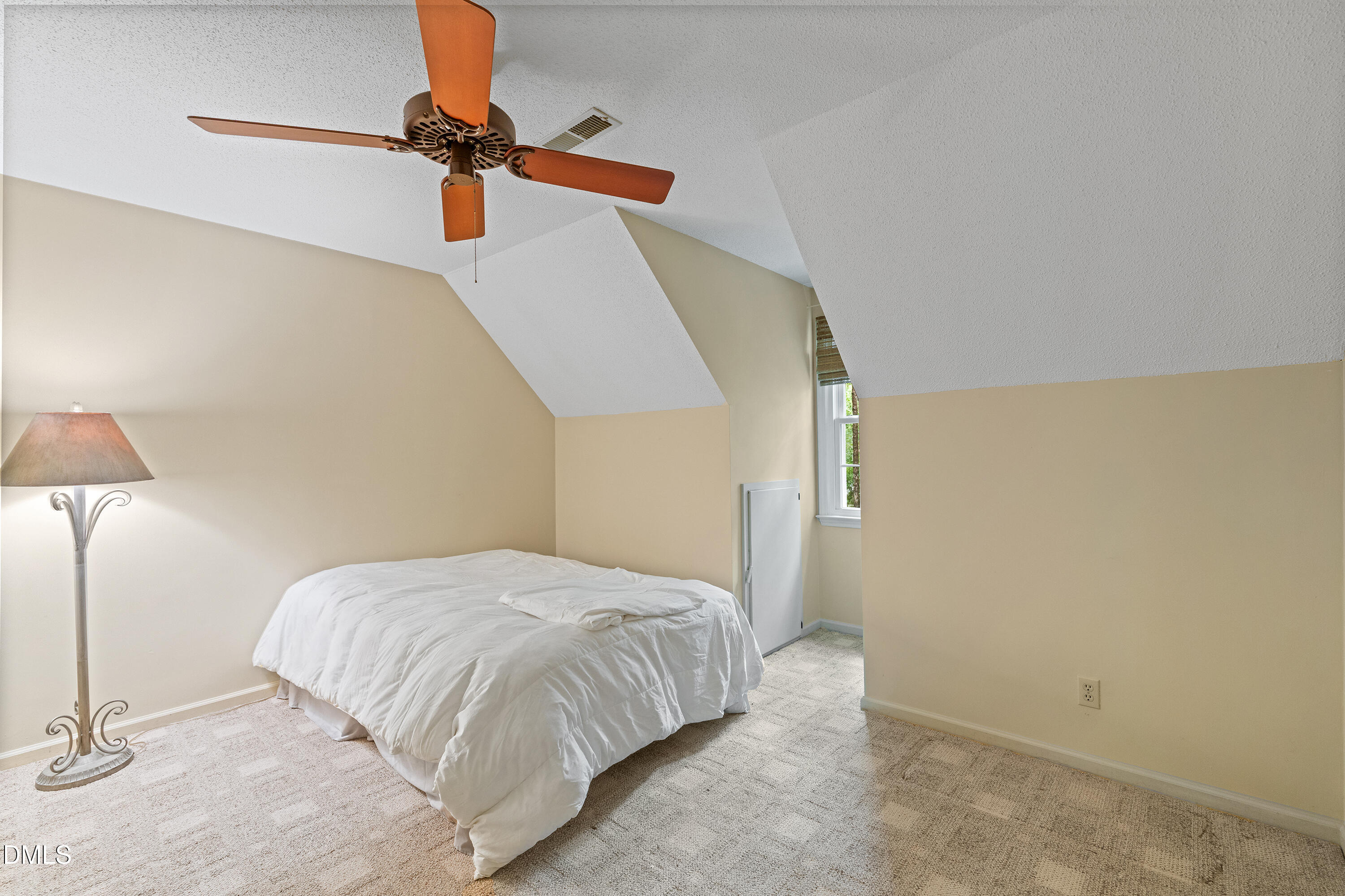 5216 Bridget Drive Raleigh, NC 27603 - Photo 16 of 30 a bedroom with a bed and a ceiling fan