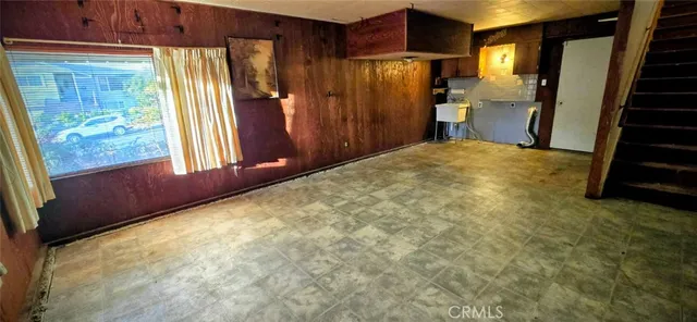 a view of a room with a fireplace