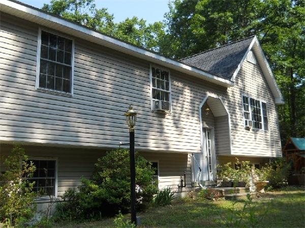 84 West Orange Road Orange, MA 01364 - Photo 1 of 7 a front view of house with yard