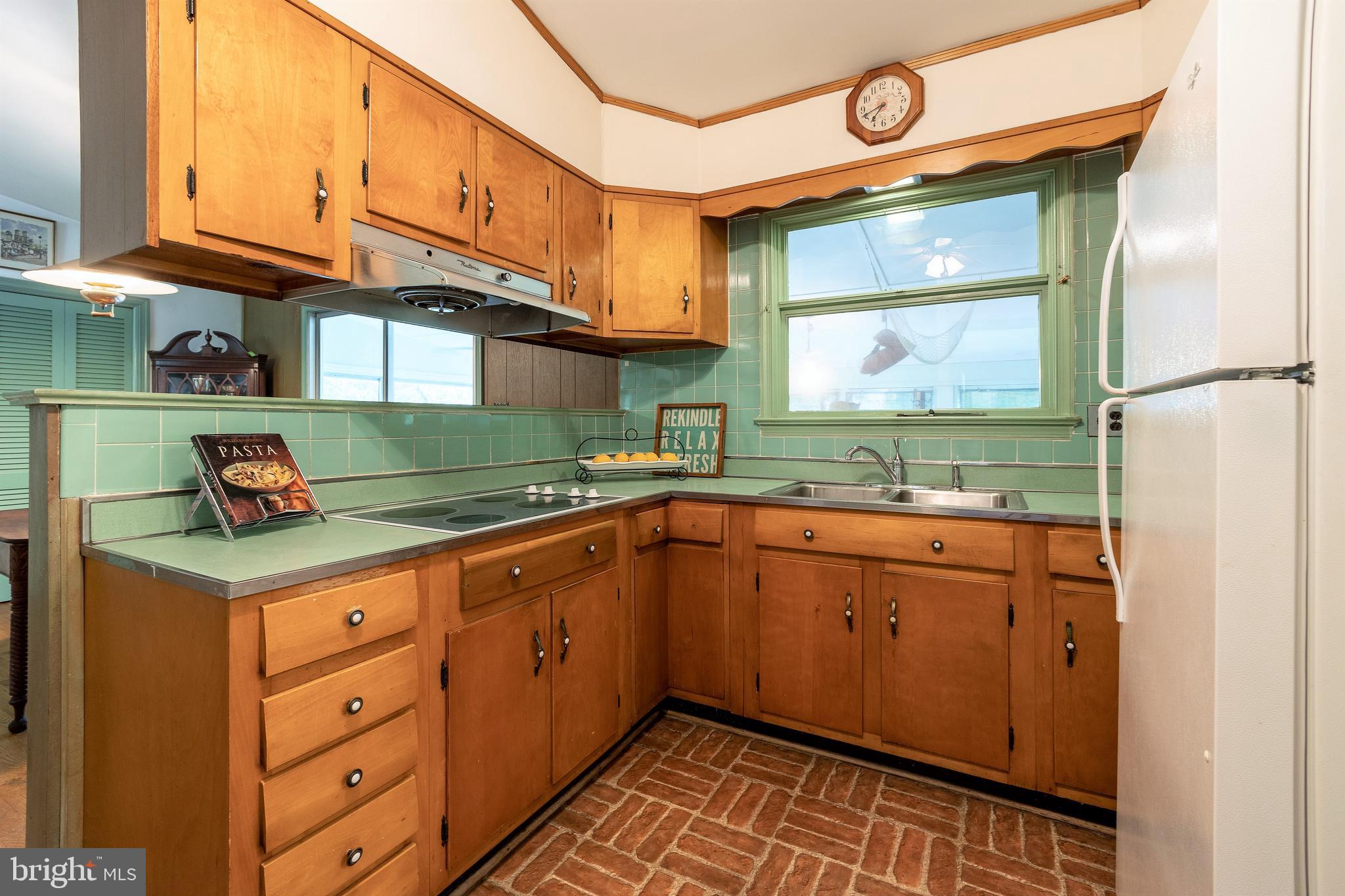 108 Boyd Drive Annapolis, MD 21403 - Photo 17 of 32 Country kitchen opens to dining area.