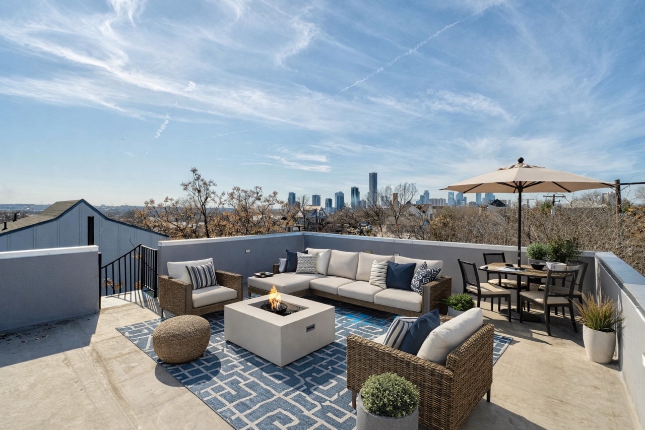 2014 East 9th Street, Unit 2 Austin, TX 78702 - Photo 1 of 23 This rooftop outdoor living area showcases sweeping 360° skyline views, creating the ultimate setting for entertaining or peaceful evenings at home. (Virtually staged)