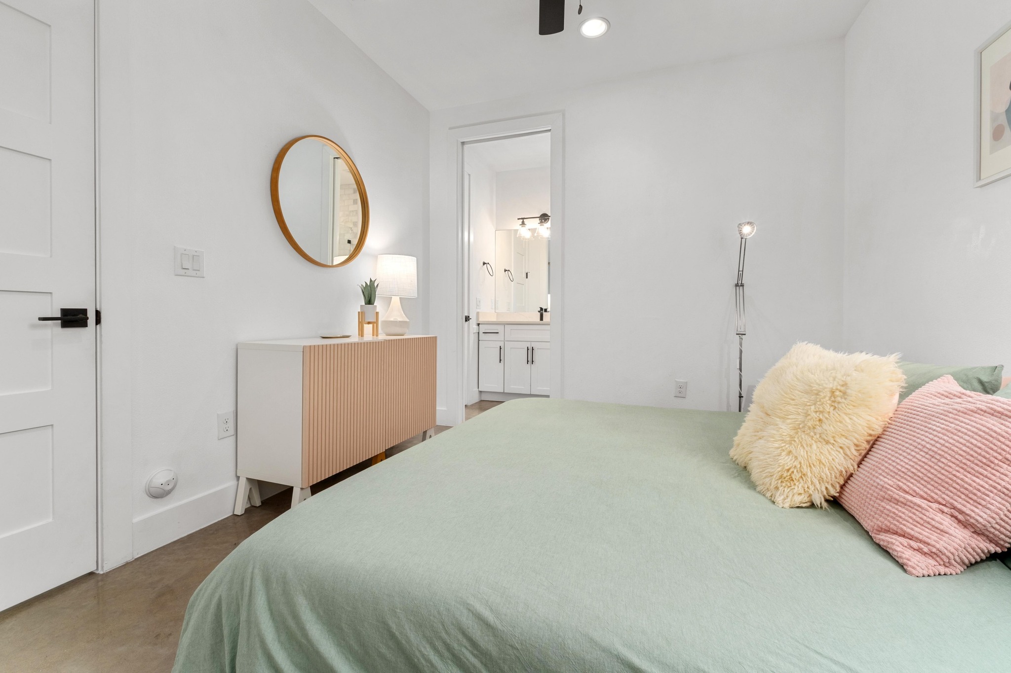 2014 East 9th Street, Unit 2 Austin, TX 78702 - Photo 15 of 23 Primary bedroom featuring a ceiling fan, recessed lighting, and ensuite bath
