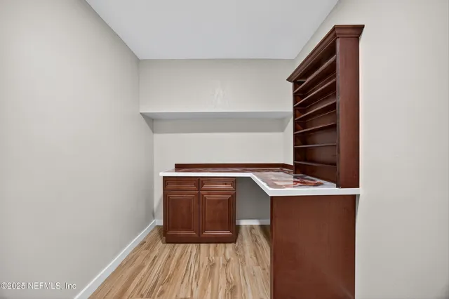 a utility room with washer and dryer