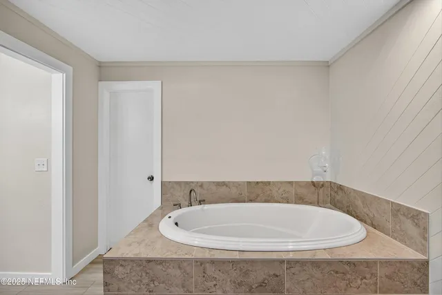 a bathroom with a bathtub