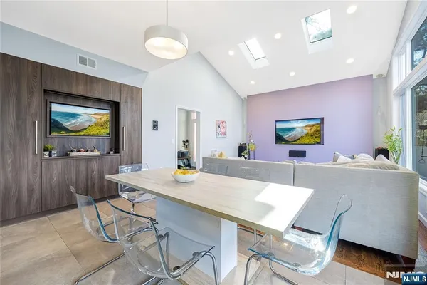 a view of gallery with wooden floor