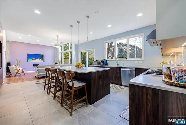 a view of hallway with wooden floor