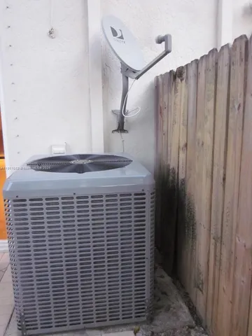 a view of a pathway both side of house