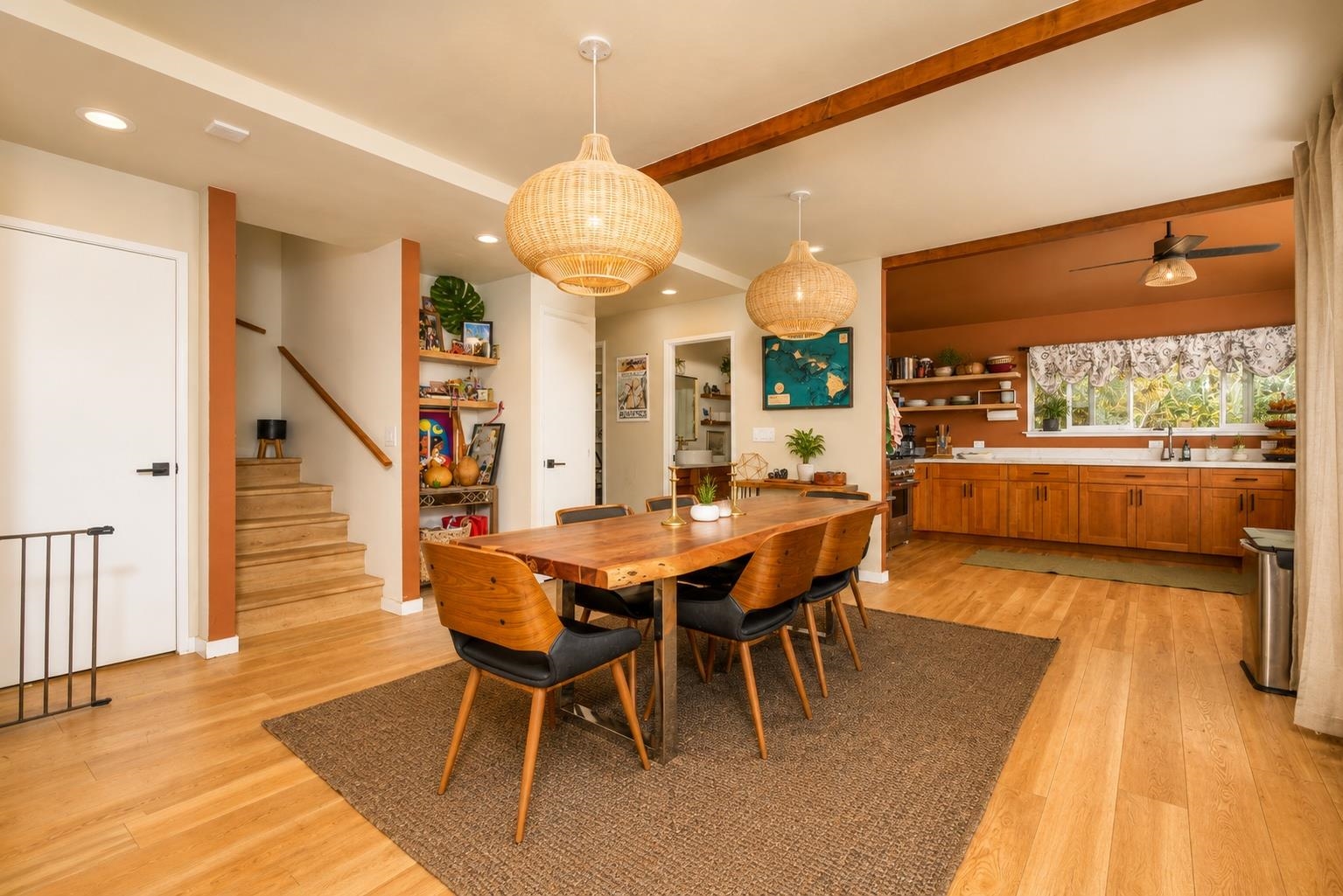 1660 Kokomo Road Haiku, HI 96708 - Photo 12 of 43 a view of a dining room with furniture wooden floor and chandelier