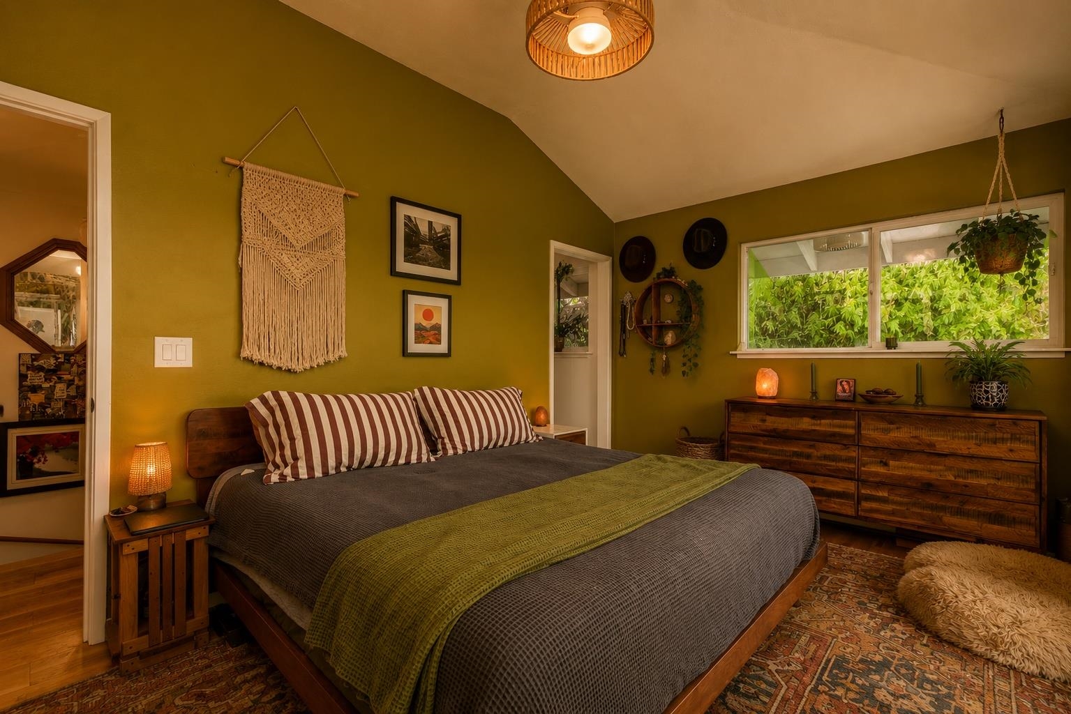 1660 Kokomo Road Haiku, HI 96708 - Photo 13 of 43 a bedroom with a bed next to a window
