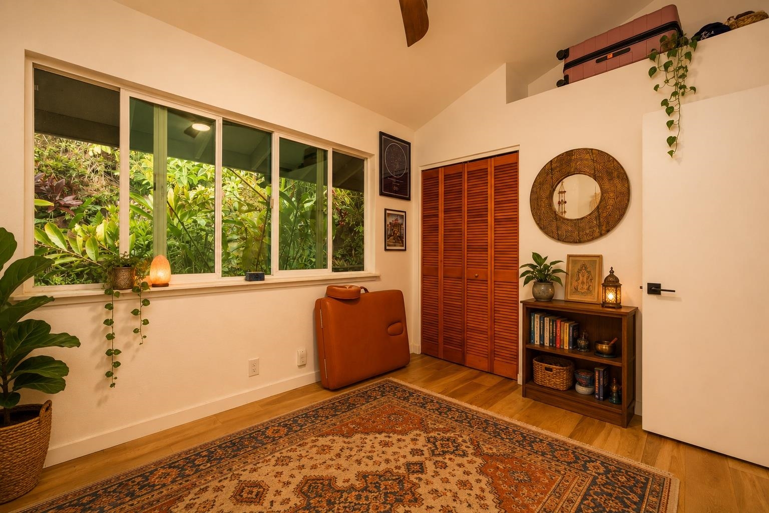1660 Kokomo Road Haiku, HI 96708 - Photo 18 of 43 a view of a room with furniture and a window