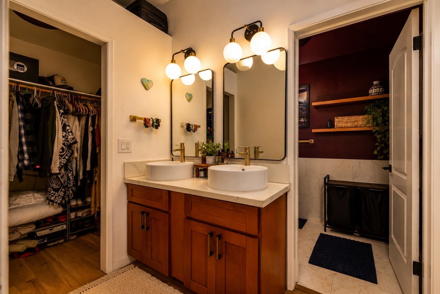 1660 Kokomo Road Haiku, HI 96708 - Photo 22 of 43 a bathroom with a sink a toilet and a mirror