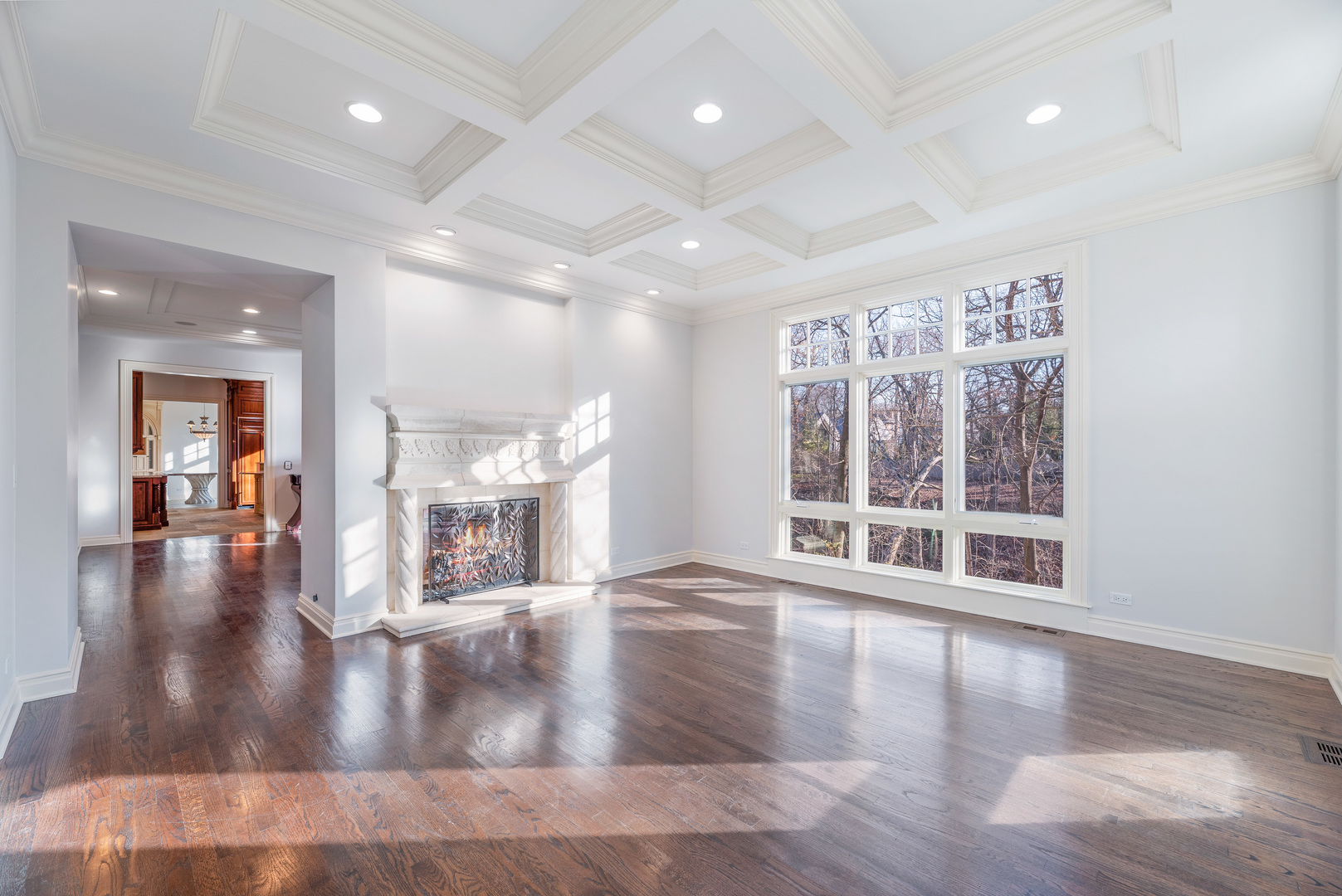 130 Maple Hill Road Glencoe, IL 60022 - Photo 13 of 54 a view of a living room and kitchen with a large window