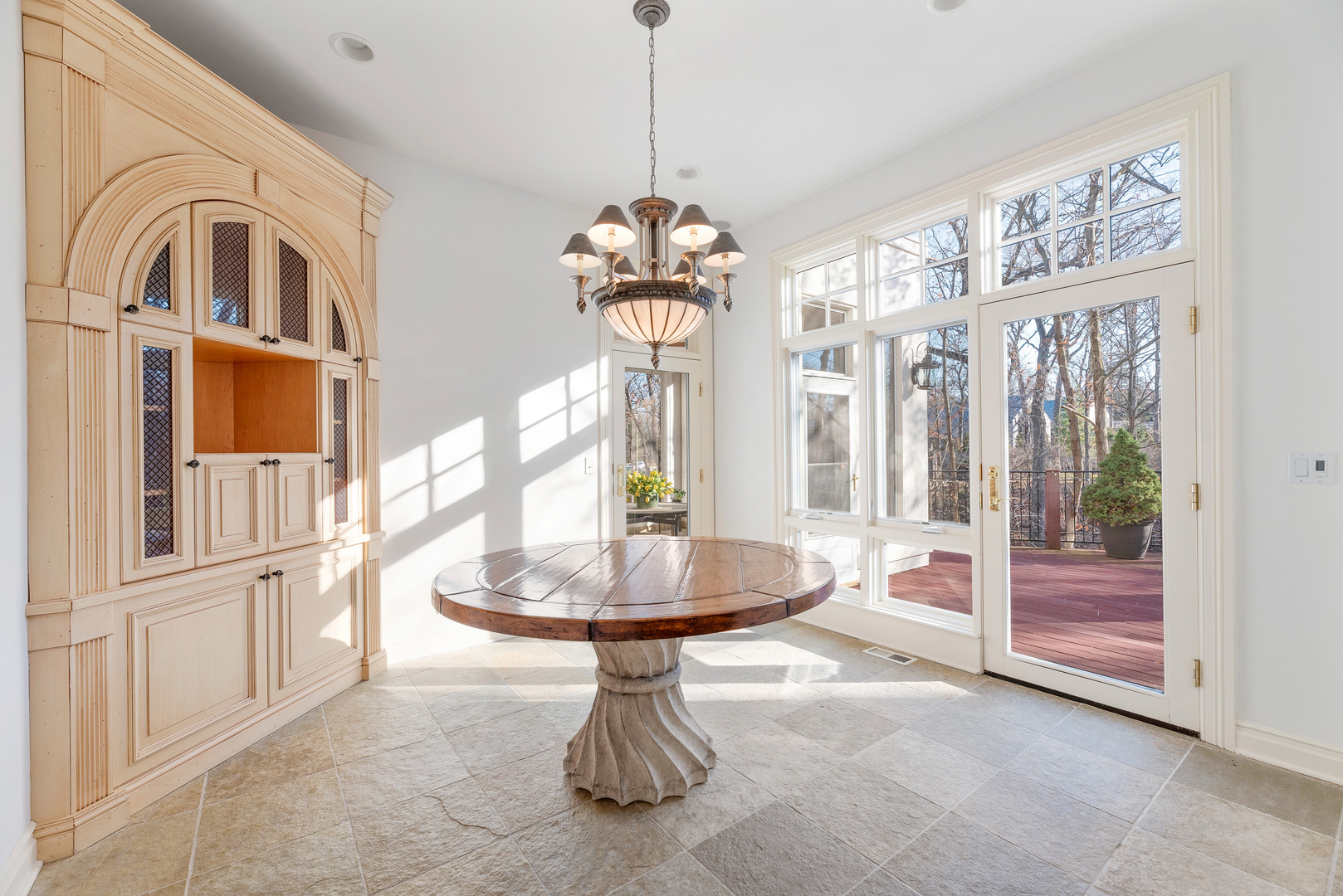 130 Maple Hill Road Glencoe, IL 60022 - Photo 17 of 54 a vase of flowers sitting on a table