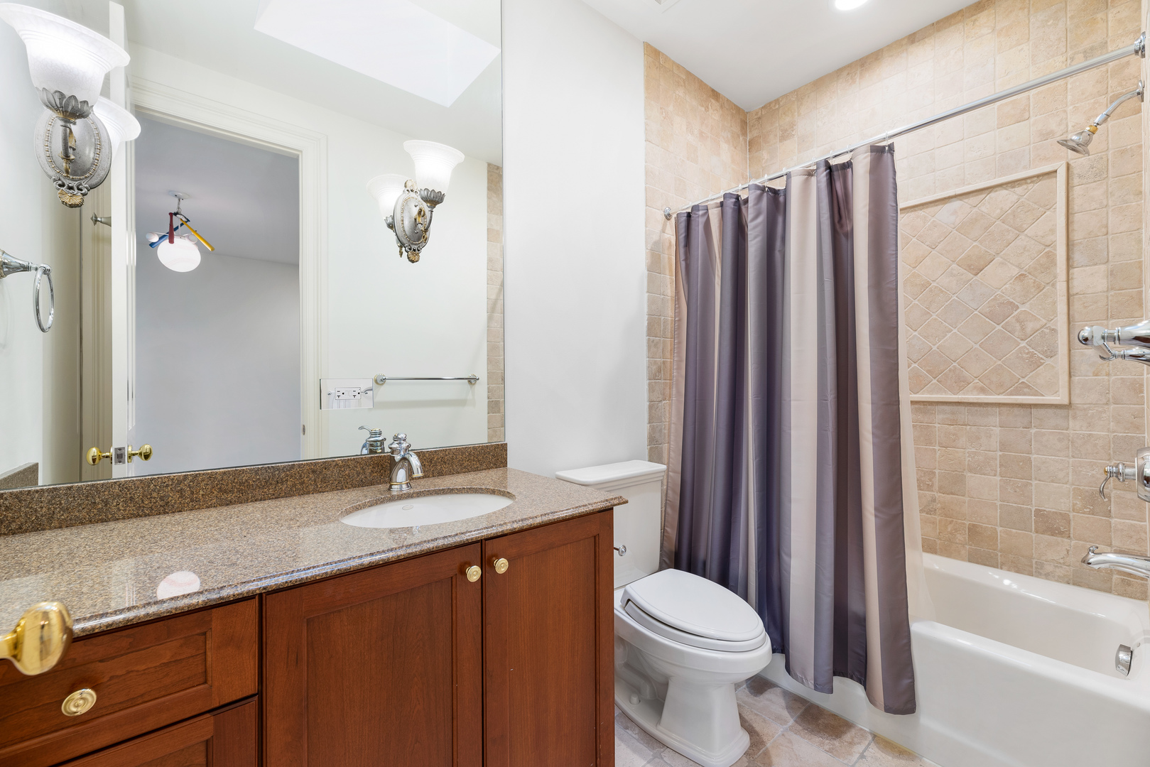 130 Maple Hill Road Glencoe, IL 60022 - Photo 35 of 54 a bathroom with a granite countertop sink toilet and shower